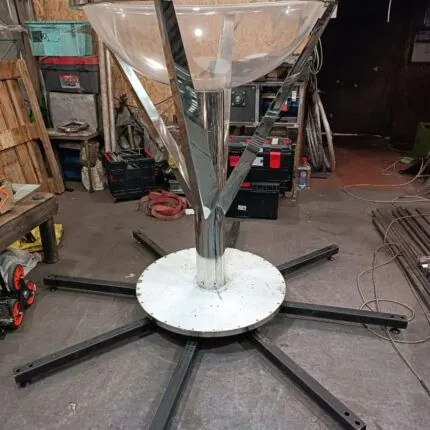 Giant acrylic martini glass prop for circus acts, stage performances, and corporate events, manufactured by Red Circle Shop
