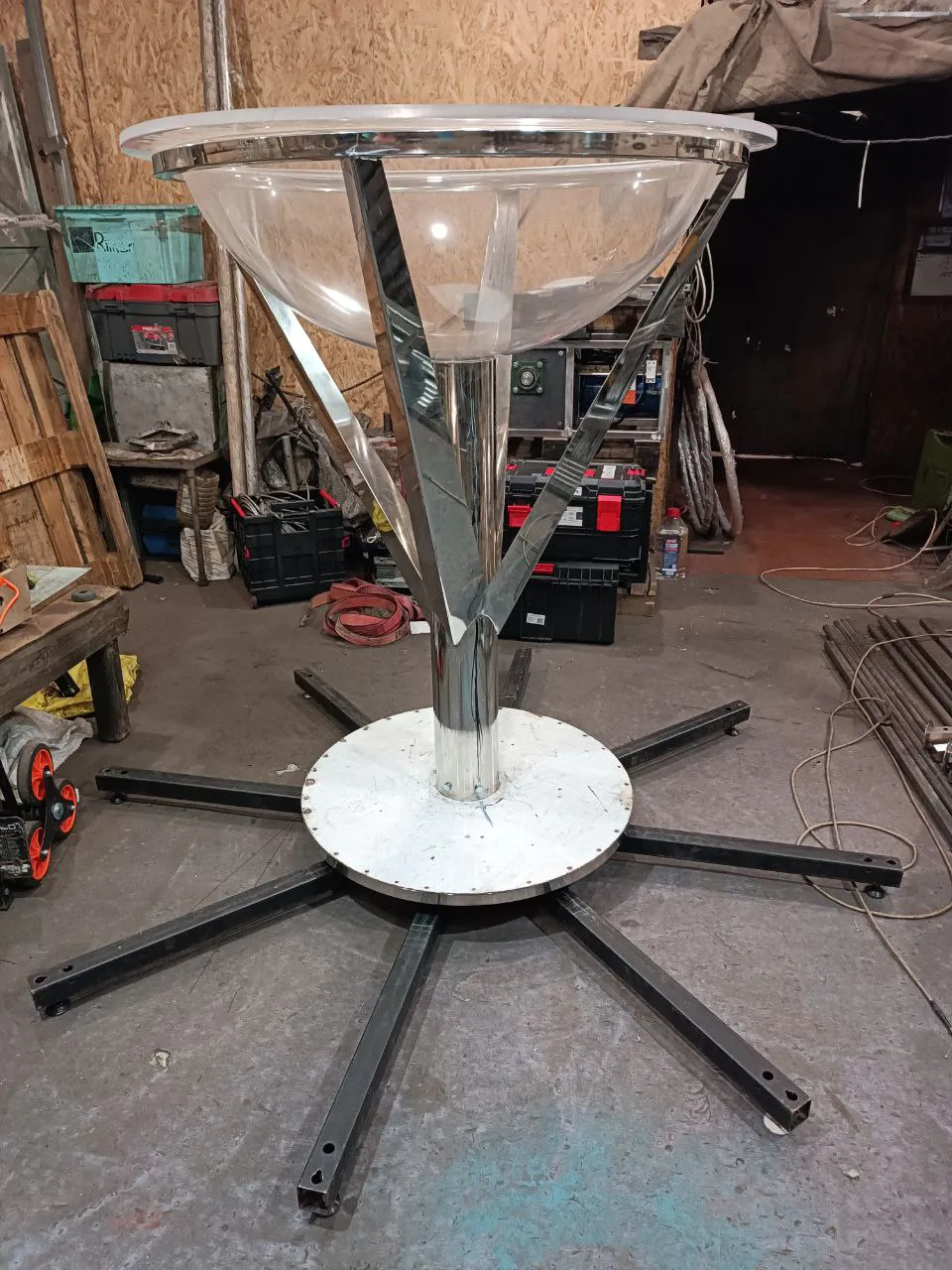 Giant acrylic martini glass prop for circus acts, stage performances, and corporate events, manufactured by Red Circle Shop